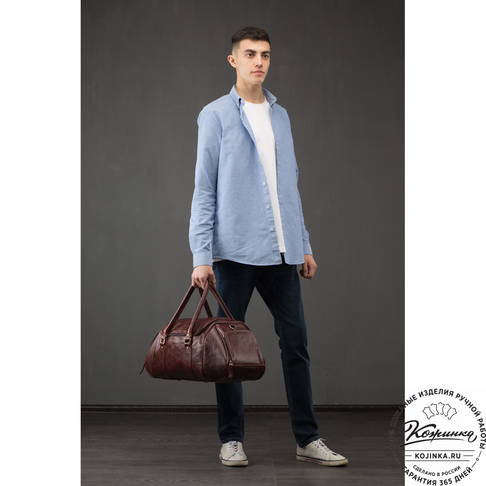 Кожаная дорожно-спортивная сумка "Дональд" (синий антик)