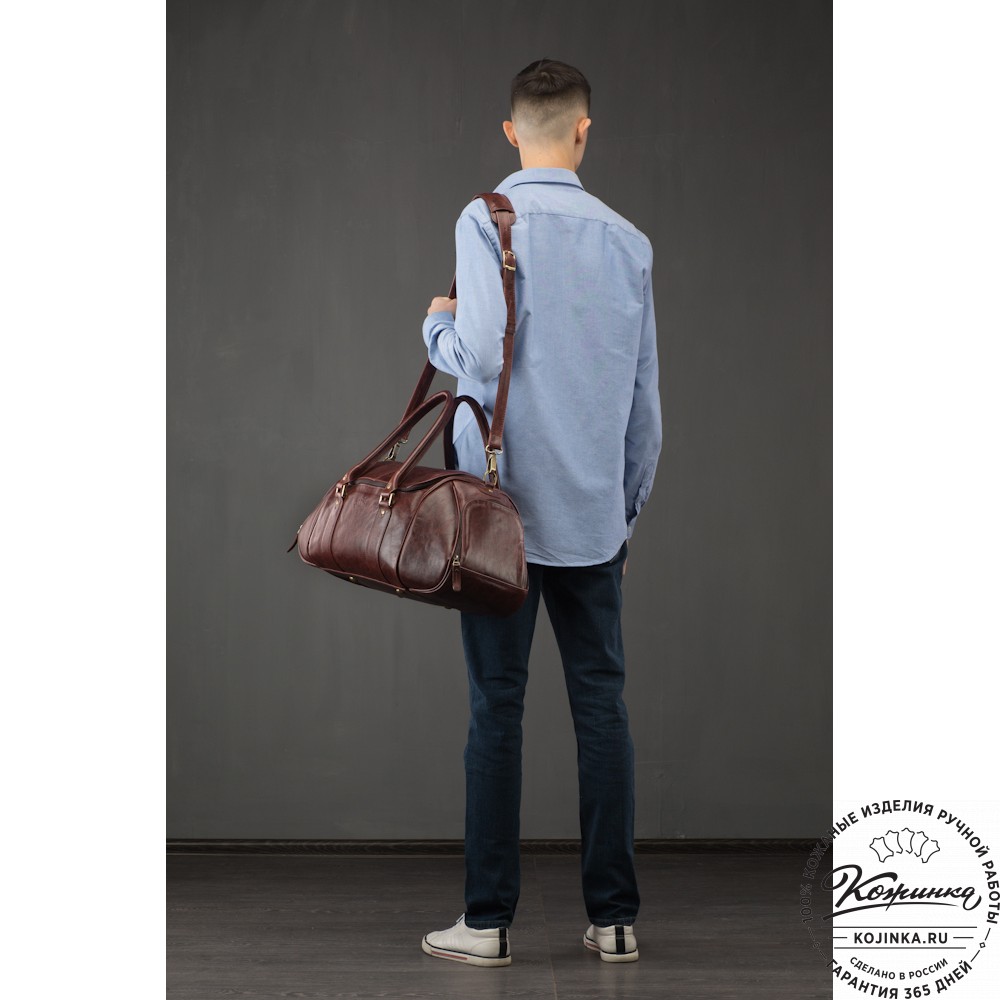 Кожаная дорожно-спортивная сумка "Дональд" (синий антик)